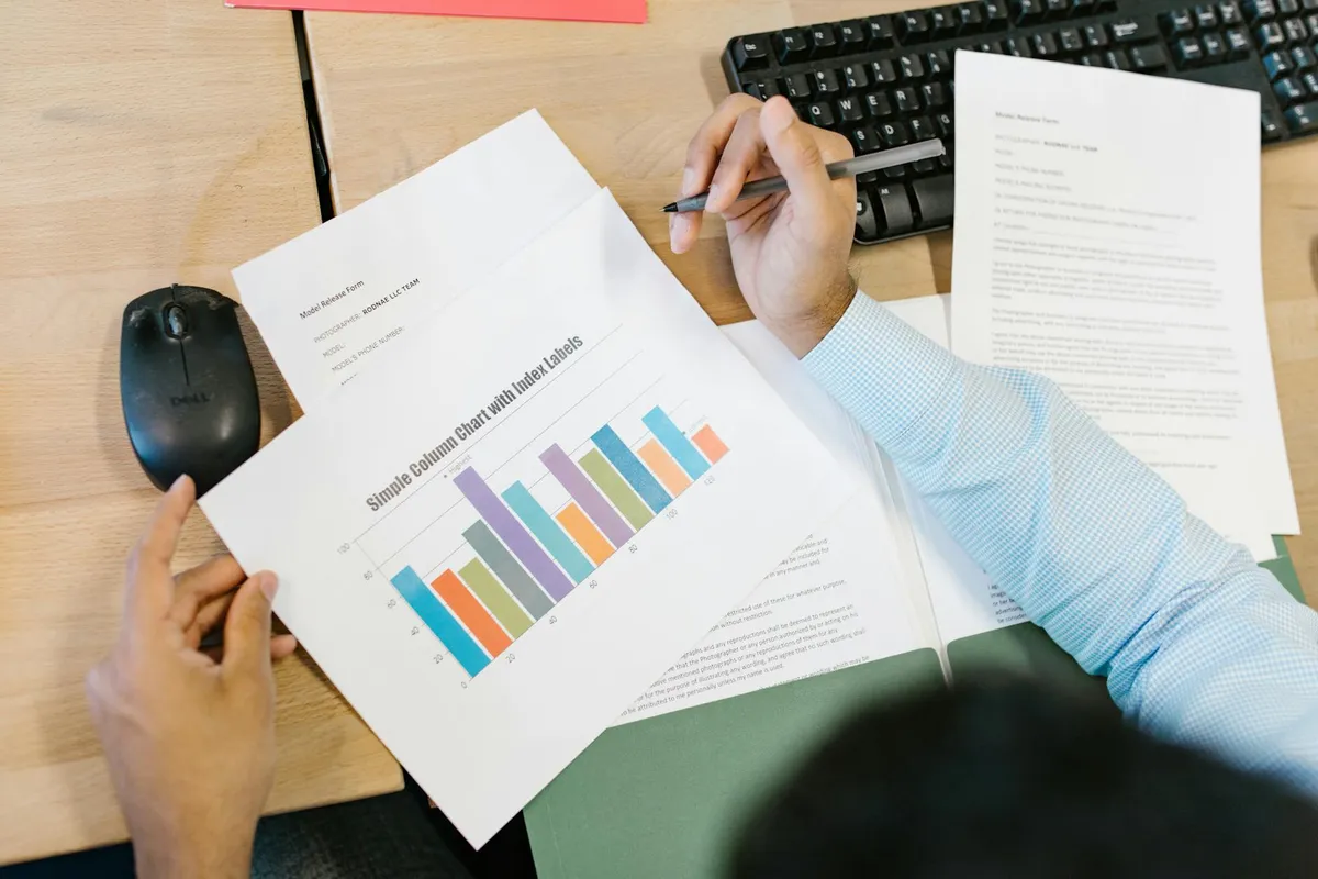Analyst research papers on a desk