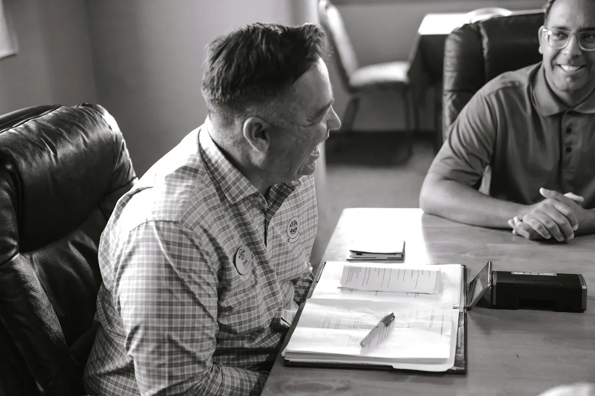 Two people in a business meeting